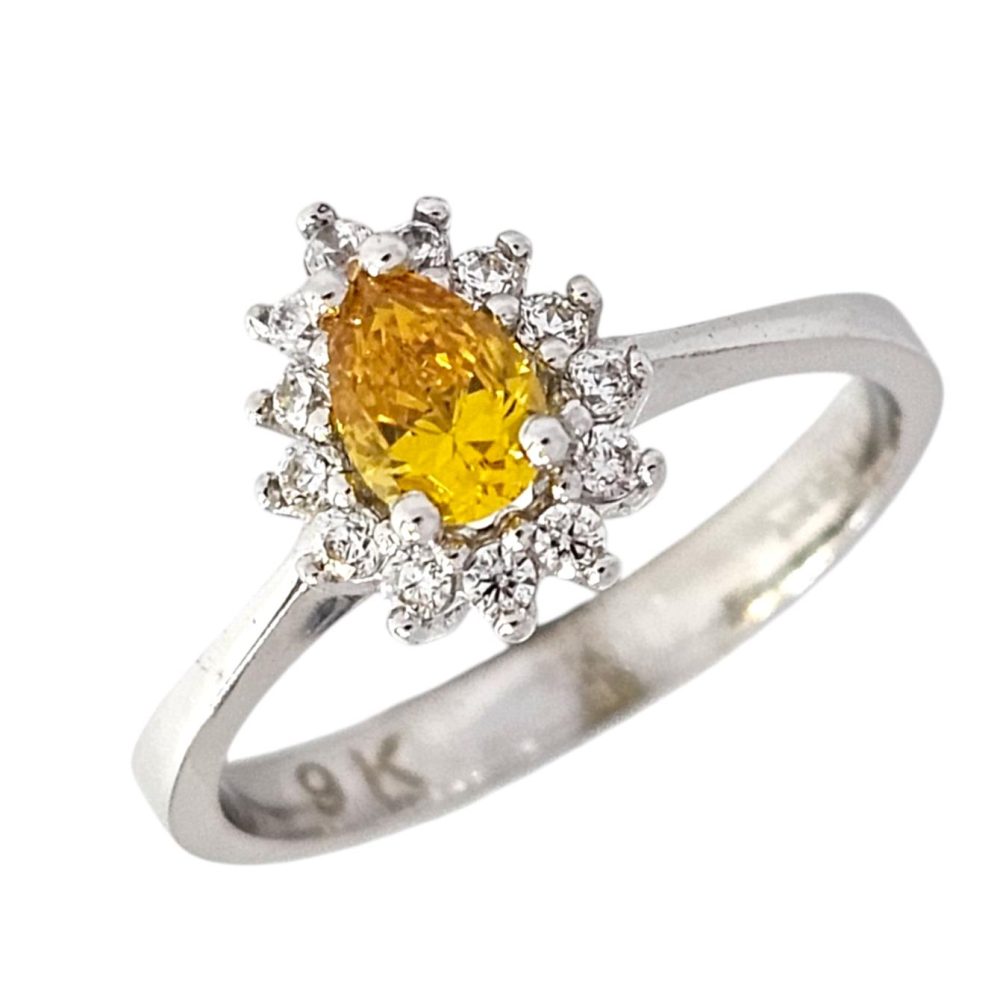 9K WHITE GOLD PEAR CUT RING